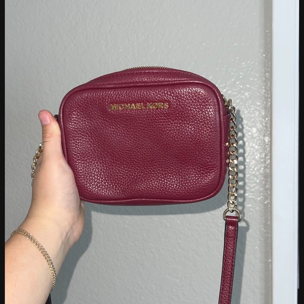 - Michael Kors Burgundy Crossbody Bag
